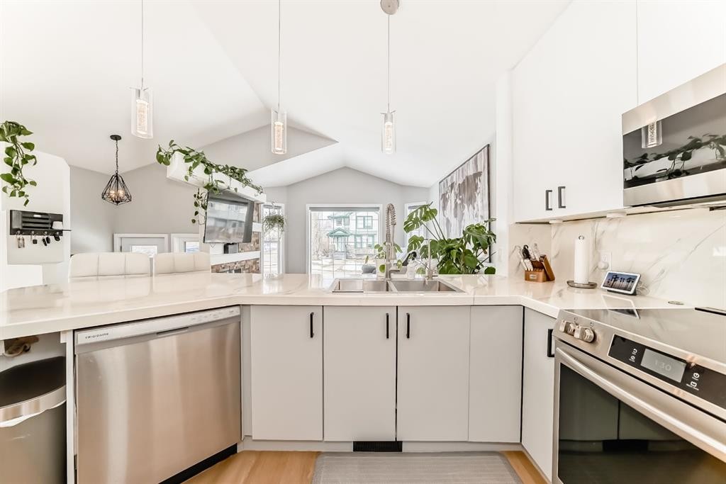 45 Hidden Hills Way Nw, Calgary, AB - Indoor Photo Showing Kitchen With Double Sink