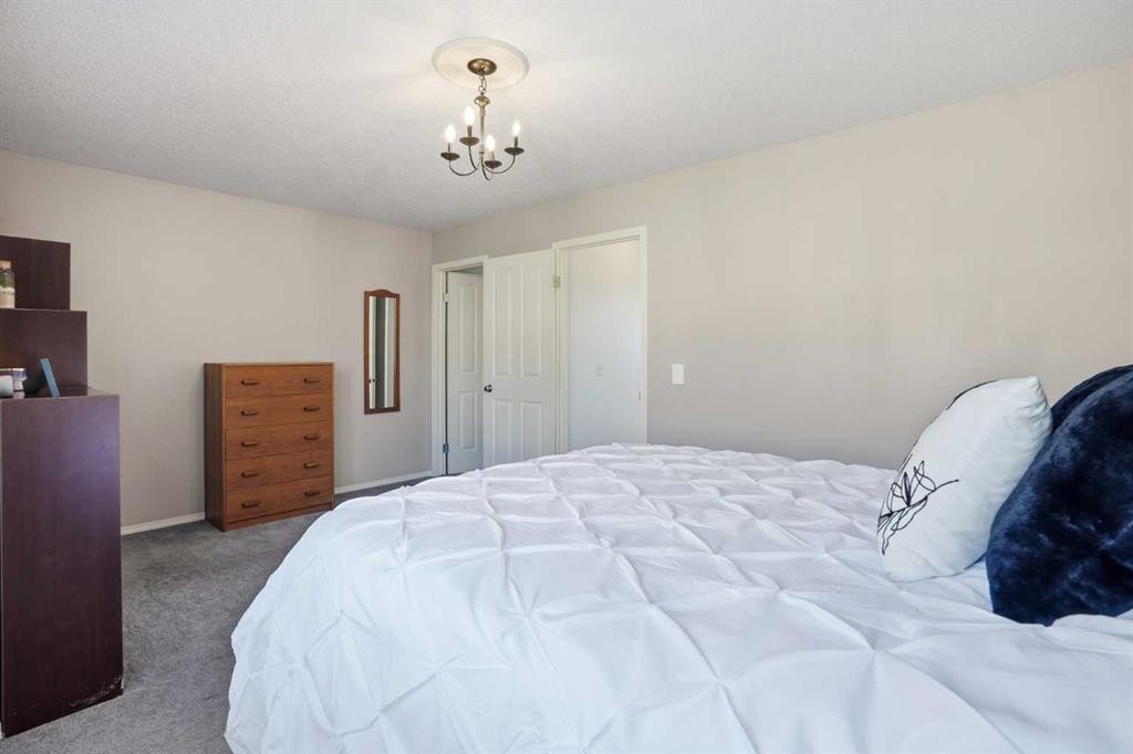 43 Everstone Place Sw, Calgary, AB - Indoor Photo Showing Bedroom