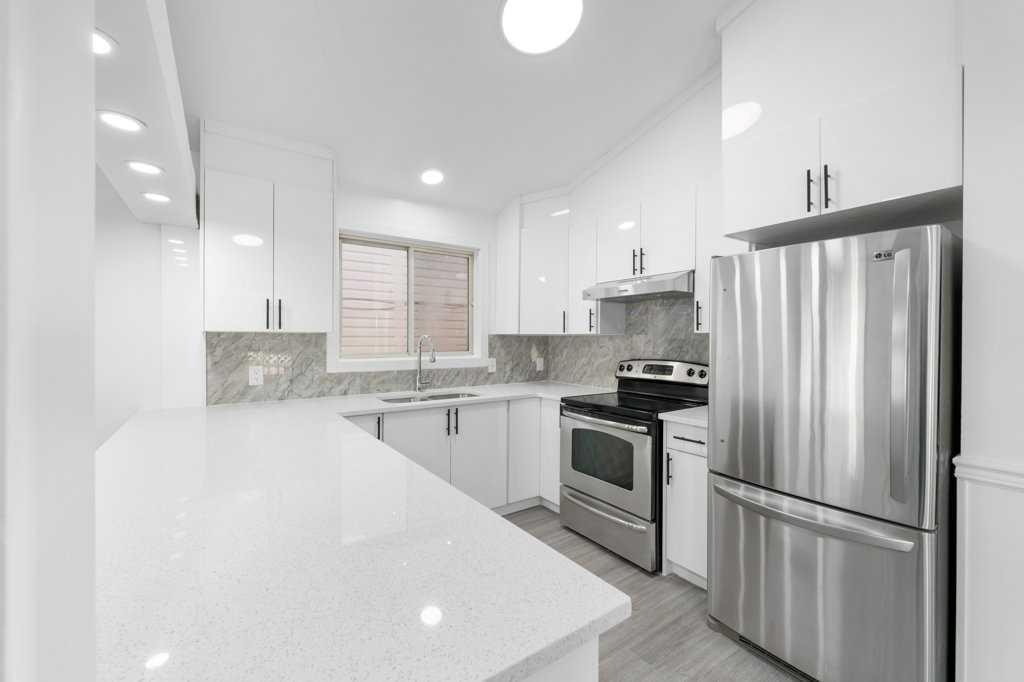361 Martinwood Place Ne, Calgary, AB - Indoor Photo Showing Kitchen With Upgraded Kitchen