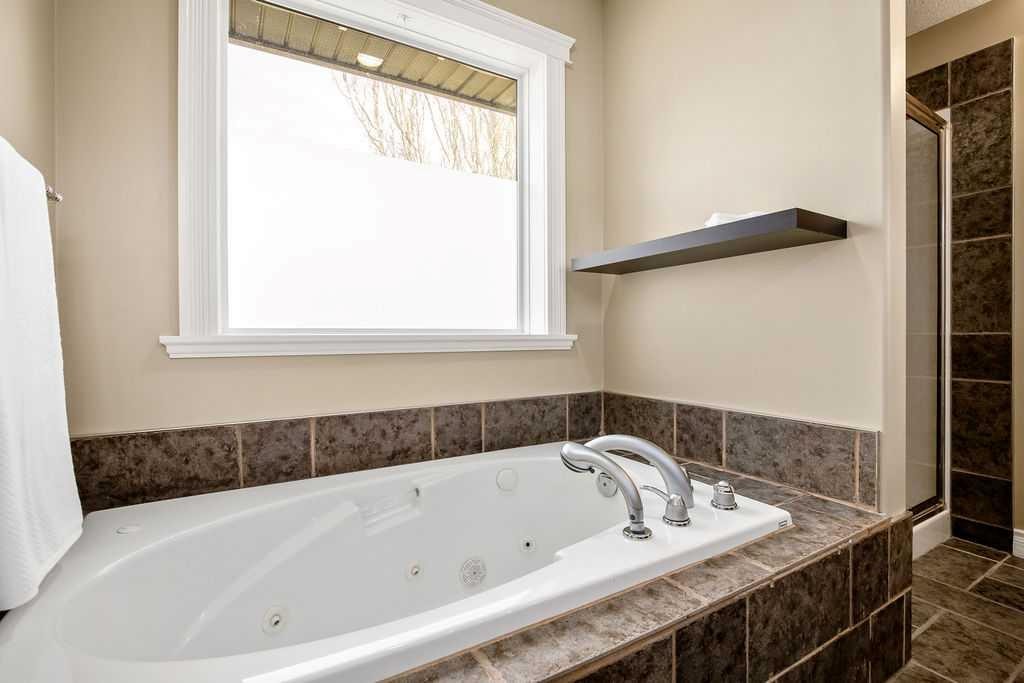 105 Lang Place, Okotoks, AB - Indoor Photo Showing Bathroom