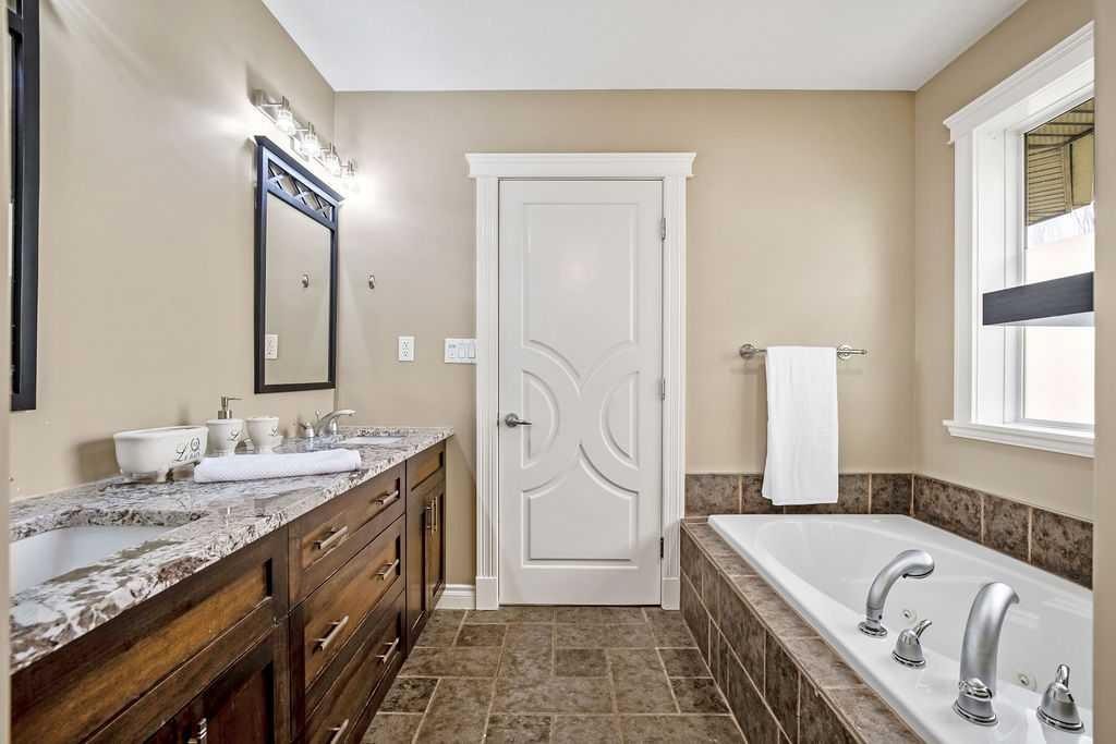 105 Lang Place, Okotoks, AB - Indoor Photo Showing Bathroom