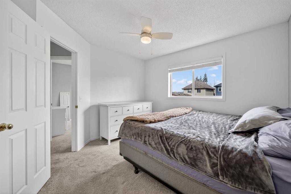 189 Copperfield Gardens Se, Calgary, AB - Indoor Photo Showing Bedroom
