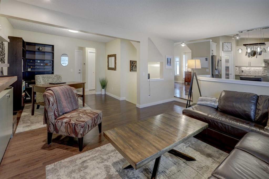 19 Riverstone Crescent Se, Calgary, AB - Indoor Photo Showing Living Room