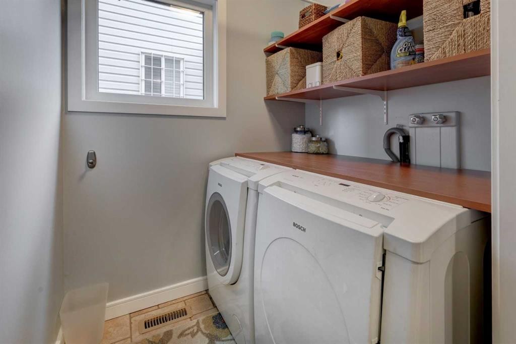 19 Riverstone Crescent Se, Calgary, AB - Indoor Photo Showing Laundry Room
