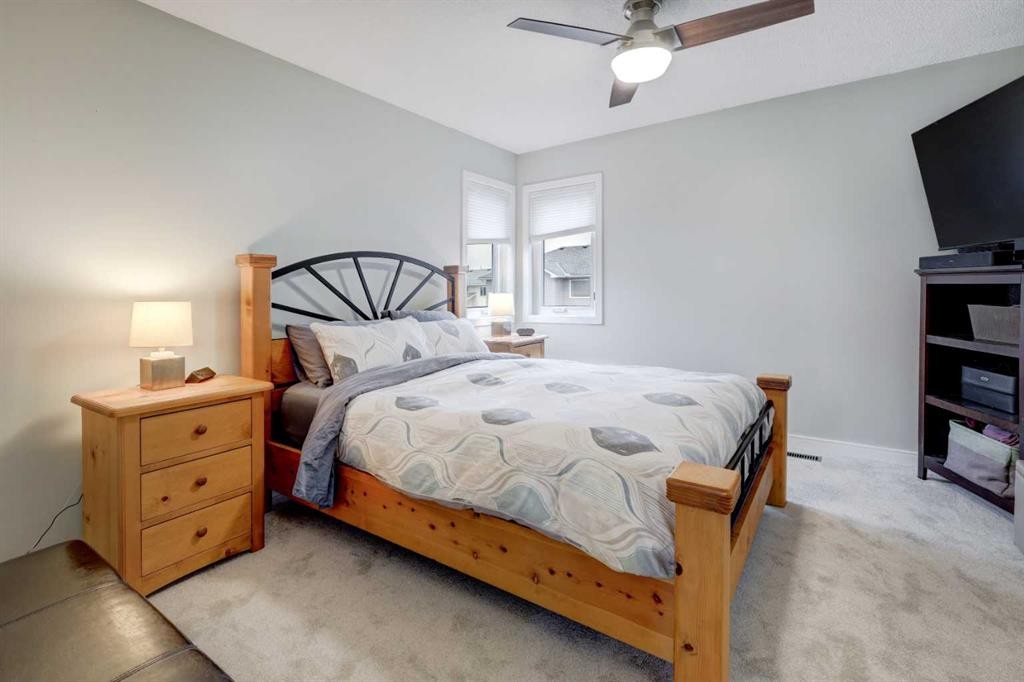 19 Riverstone Crescent Se, Calgary, AB - Indoor Photo Showing Bedroom