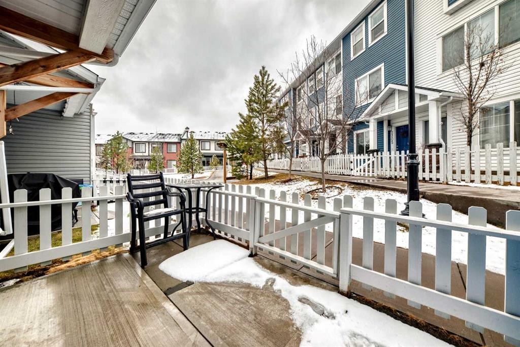1302 Jumping Pound Common, Cochrane, AB - Outdoor With Deck Patio Veranda