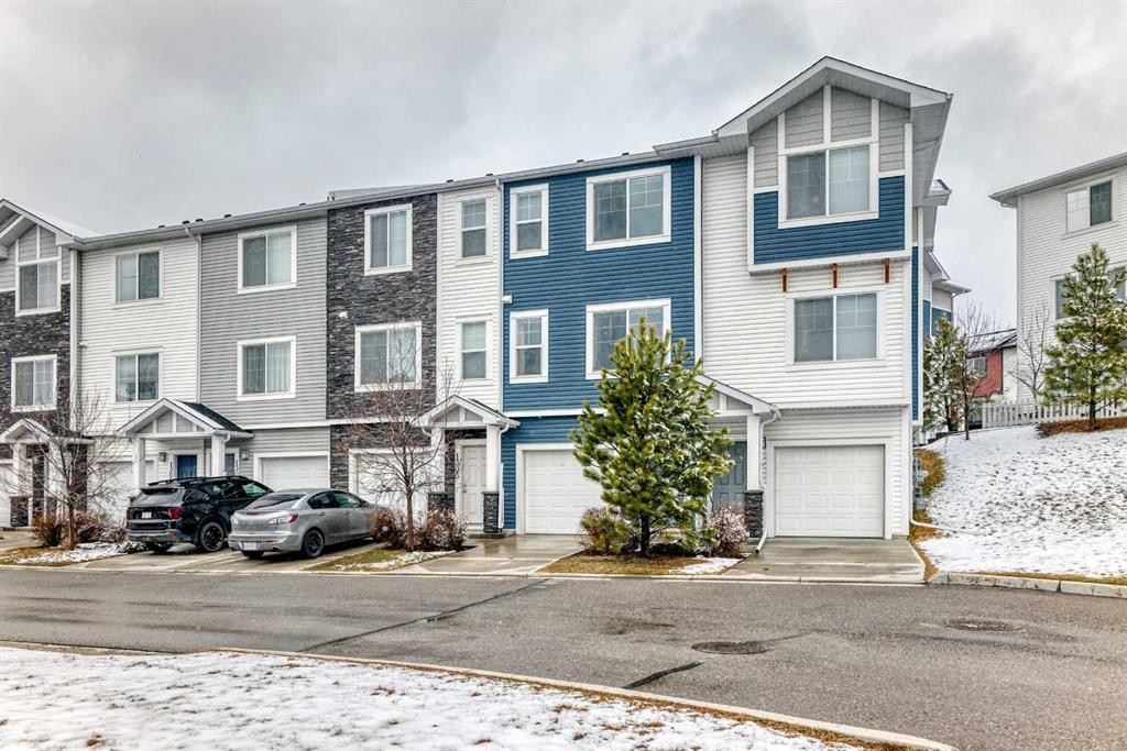 1302 Jumping Pound Common, Cochrane, AB - Outdoor With Facade