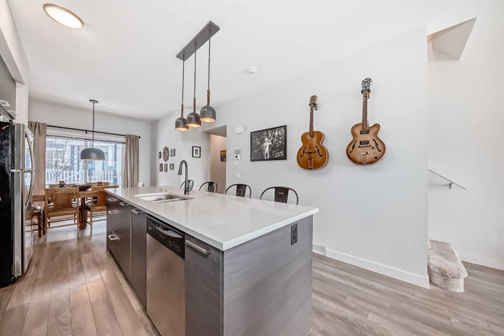 1302 Jumping Pound Common, Cochrane, AB - Indoor Photo Showing Kitchen