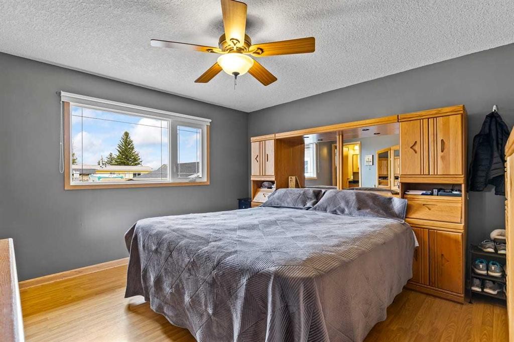 302 Stuart Street, Blackie, AB - Indoor Photo Showing Bedroom