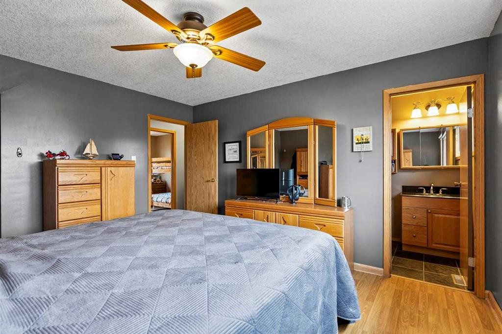 302 Stuart Street, Blackie, AB - Indoor Photo Showing Bedroom