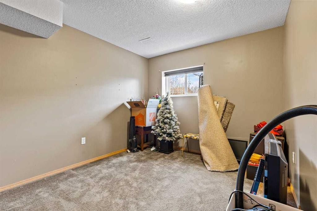 302 Stuart Street, Blackie, AB - Indoor Photo Showing Other Room