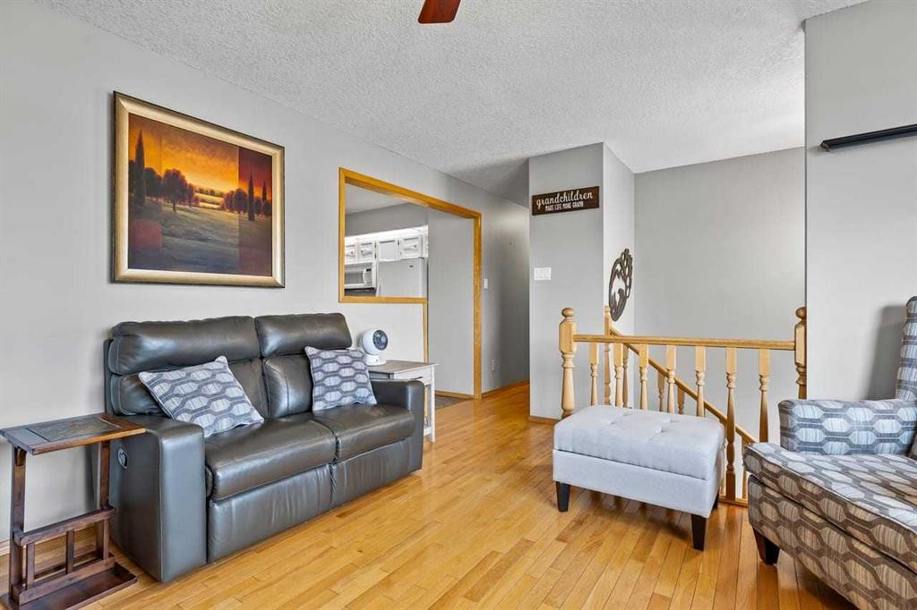 302 Stuart Street, Blackie, AB - Indoor Photo Showing Living Room