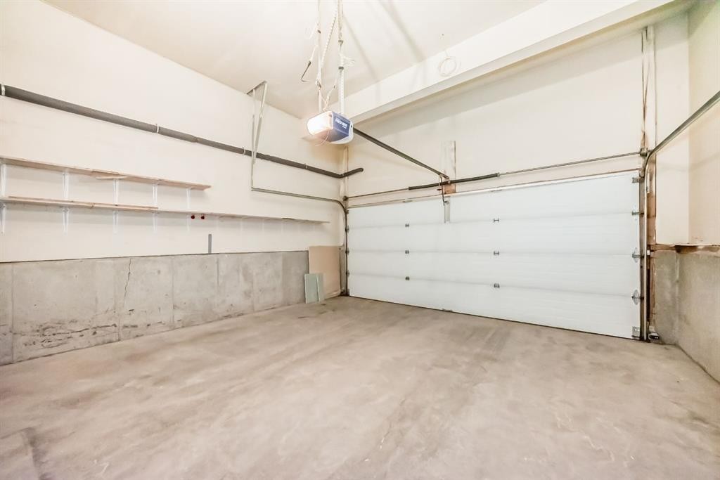 155 Prominence Heights Sw, Calgary, AB - Indoor Photo Showing Garage
