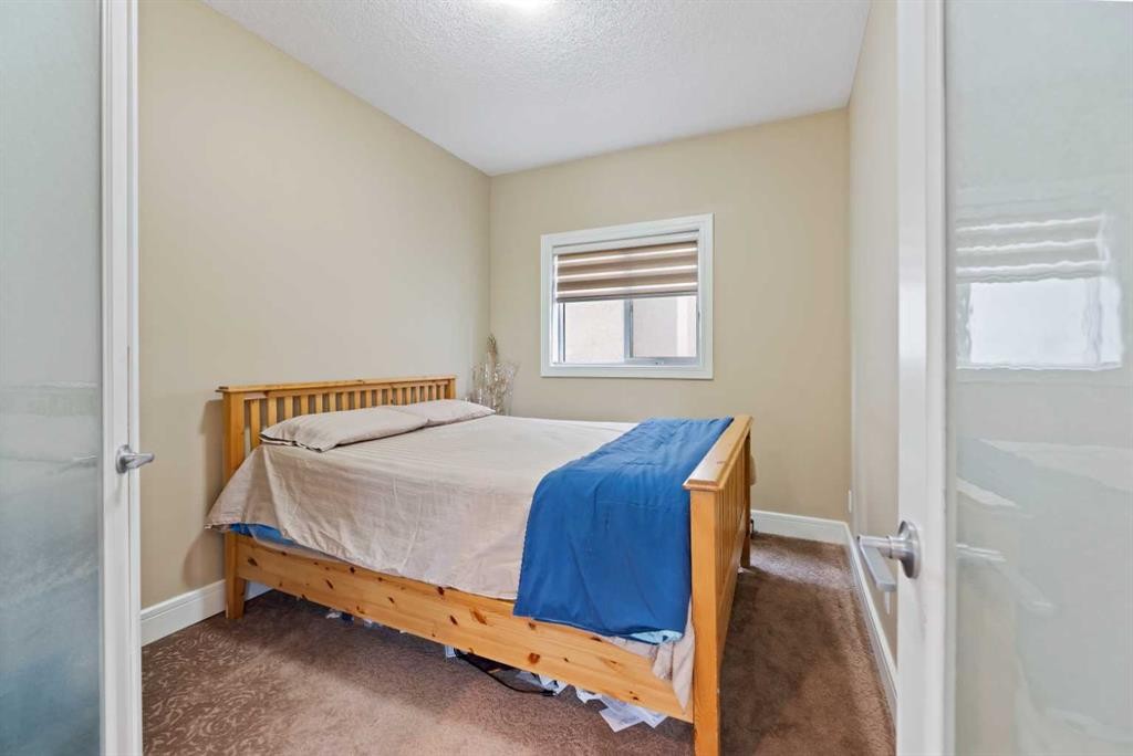 150 Saddlelake Grove Ne, Calgary, AB - Indoor Photo Showing Bedroom