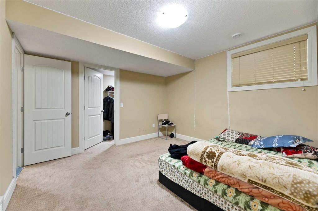 150 Saddlelake Grove Ne, Calgary, AB - Indoor Photo Showing Bedroom