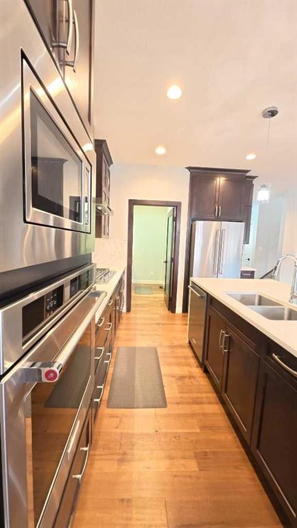 144 Red Embers Square Ne, Calgary, AB - Indoor Photo Showing Kitchen With Stainless Steel Kitchen With Double Sink