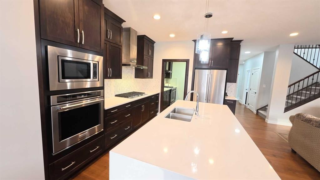 144 Red Embers Square Ne, Calgary, AB - Indoor Photo Showing Kitchen With Stainless Steel Kitchen With Double Sink With Upgraded Kitchen