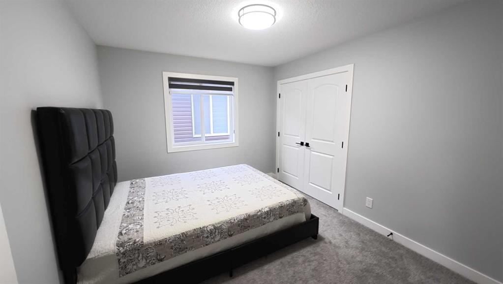 144 Red Embers Square Ne, Calgary, AB - Indoor Photo Showing Bedroom
