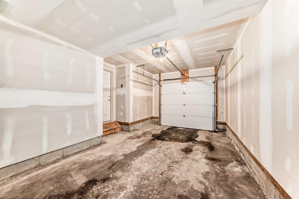 806-32 Red Embers Parade Ne, Calgary, AB - Indoor Photo Showing Garage