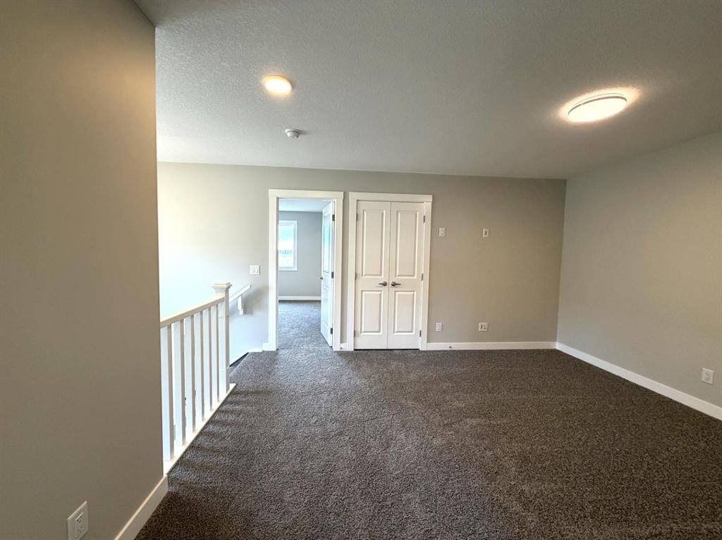 60 Ambledale Crescent, Calgary, AB - Indoor Photo Showing Other Room