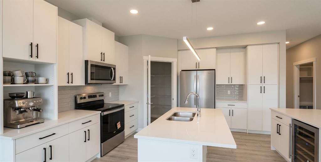 60 Ambledale Crescent, Calgary, AB - Indoor Photo Showing Kitchen With Stainless Steel Kitchen With Double Sink With Upgraded Kitchen