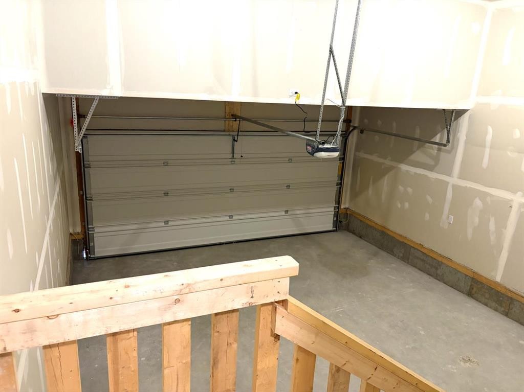 60 Ambledale Crescent, Calgary, AB - Indoor Photo Showing Garage