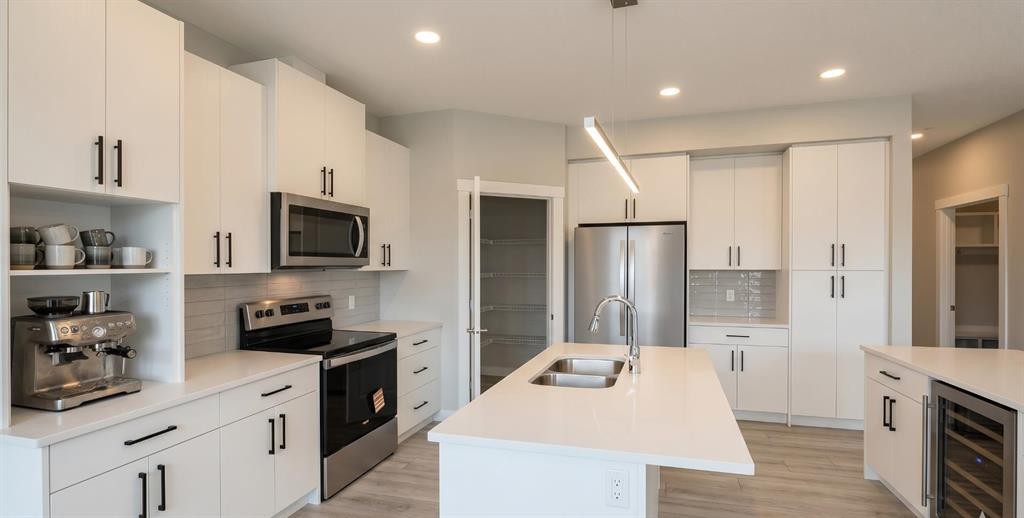 60 Ambledale Crescent, Calgary, AB - Indoor Photo Showing Kitchen With Stainless Steel Kitchen With Double Sink With Upgraded Kitchen