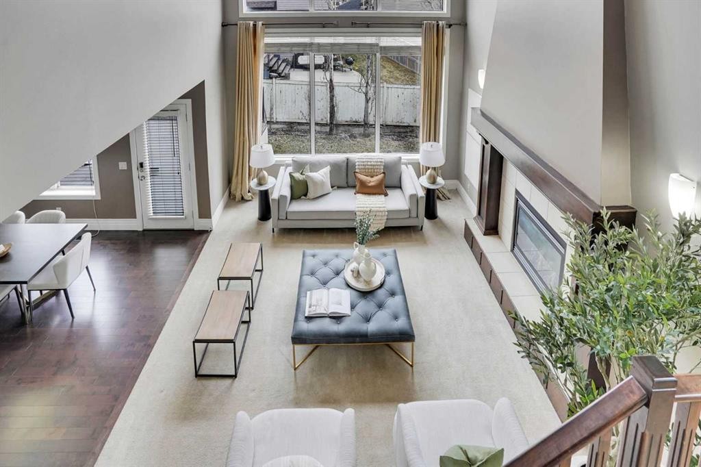 274 Everoak Drive Sw, Calgary, AB - Indoor Photo Showing Other Room With Fireplace