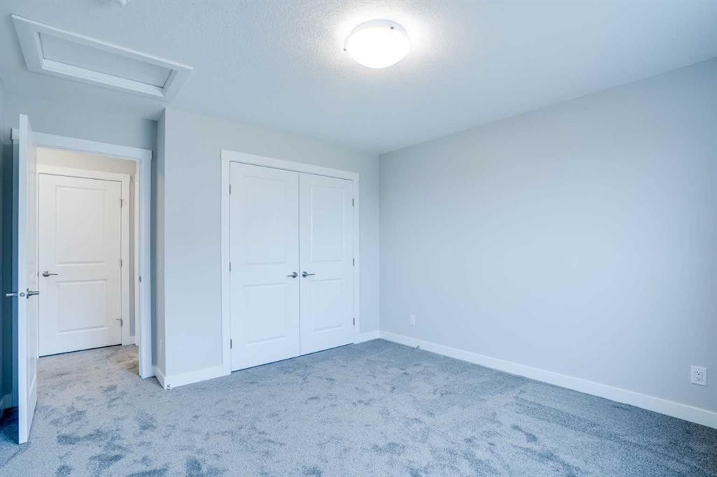 77 Calhoun Crescent Ne, Calgary, AB - Indoor Photo Showing Other Room