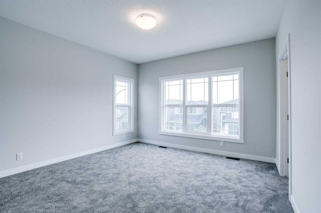 77 Calhoun Crescent Ne, Calgary, AB - Indoor Photo Showing Other Room
