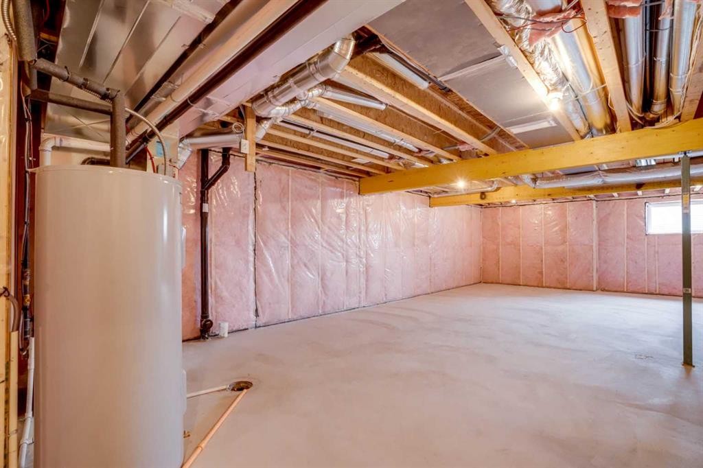 77 Calhoun Crescent Ne, Calgary, AB - Indoor Photo Showing Basement