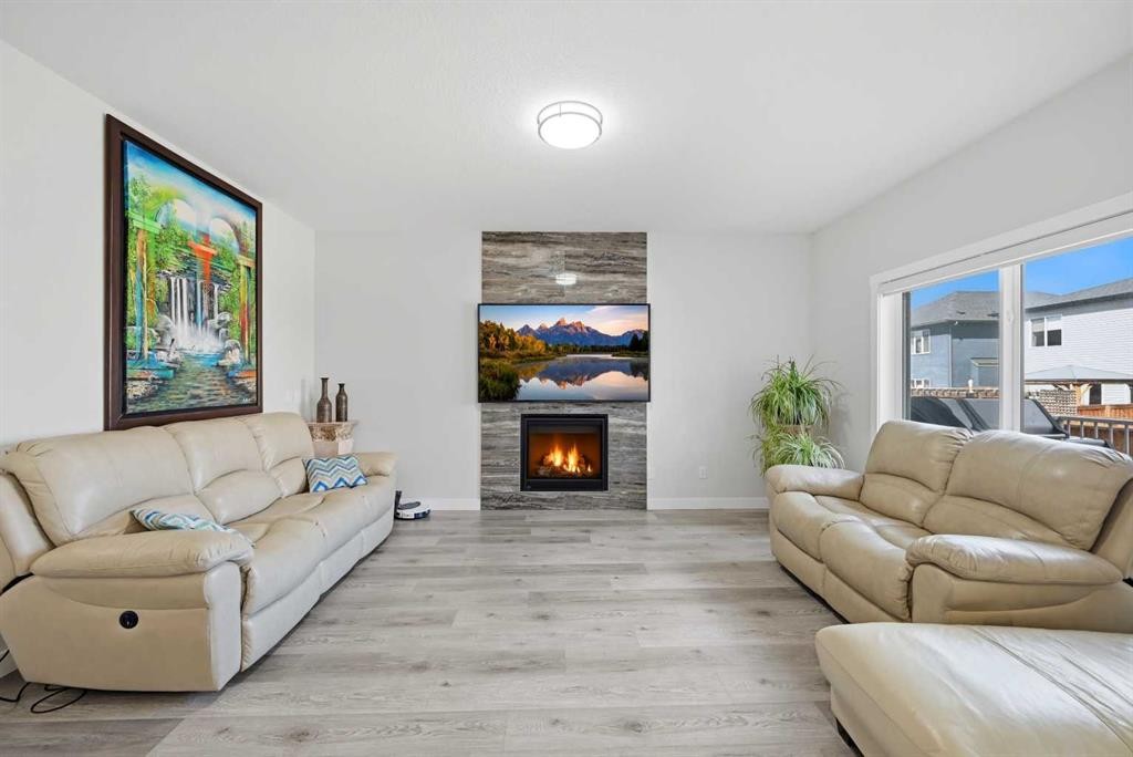 82 Legacy Glen Terrace Se, Calgary, AB - Indoor Photo Showing Living Room With Fireplace