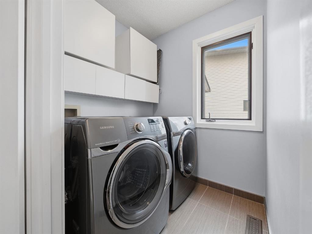 247 Hidden Valley Place Nw, Calgary, AB - Indoor Photo Showing Laundry Room
