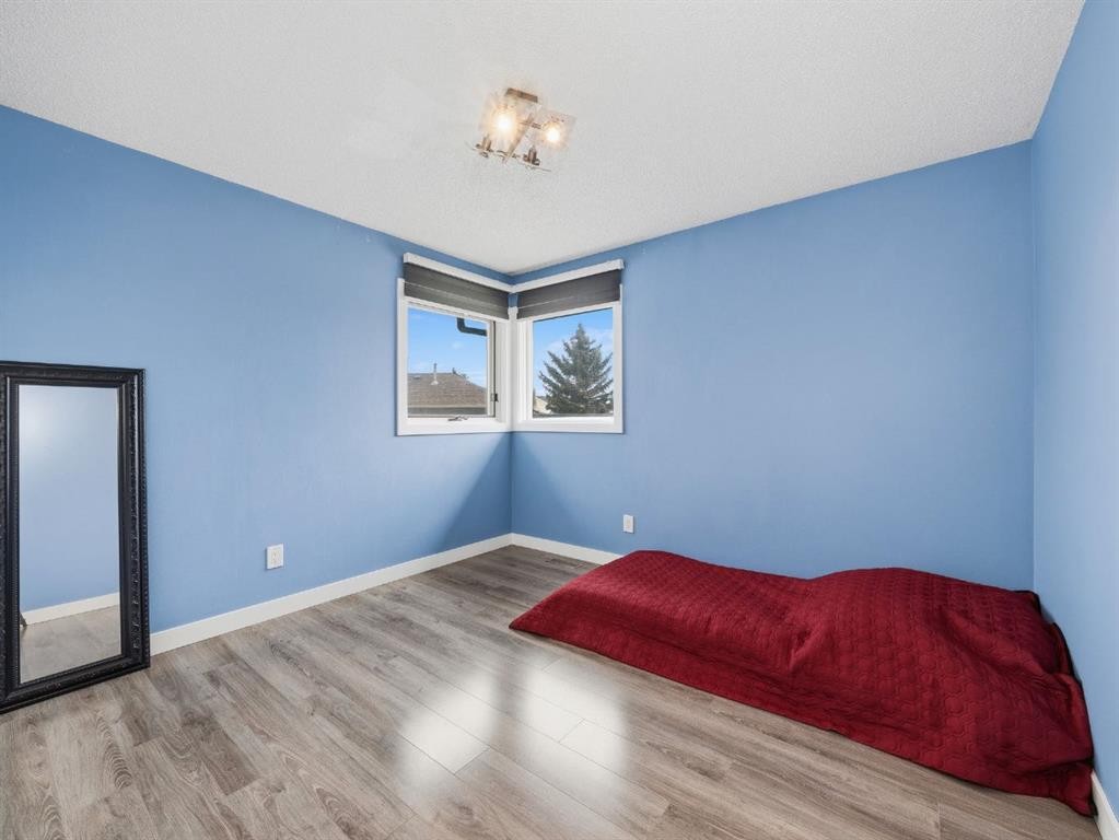 247 Hidden Valley Place Nw, Calgary, AB - Indoor Photo Showing Bedroom