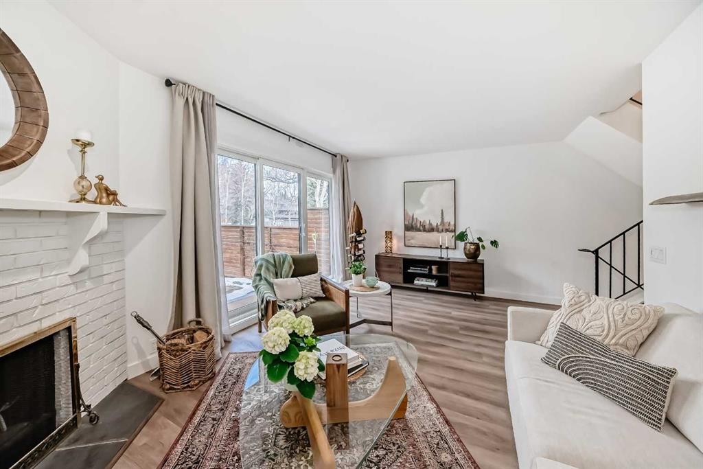 60 Point Drive Nw, Calgary, AB - Indoor Photo Showing Living Room With Fireplace