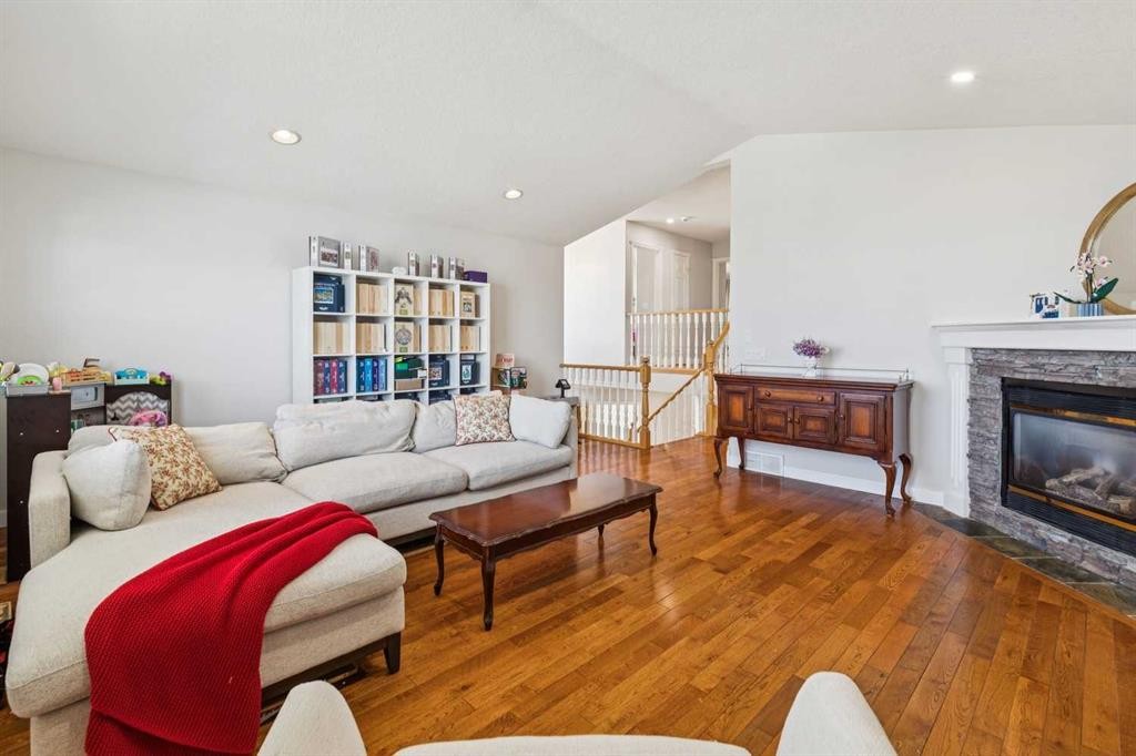 450 Wentworth Place Sw, Calgary, AB - Indoor Photo Showing Living Room With Fireplace