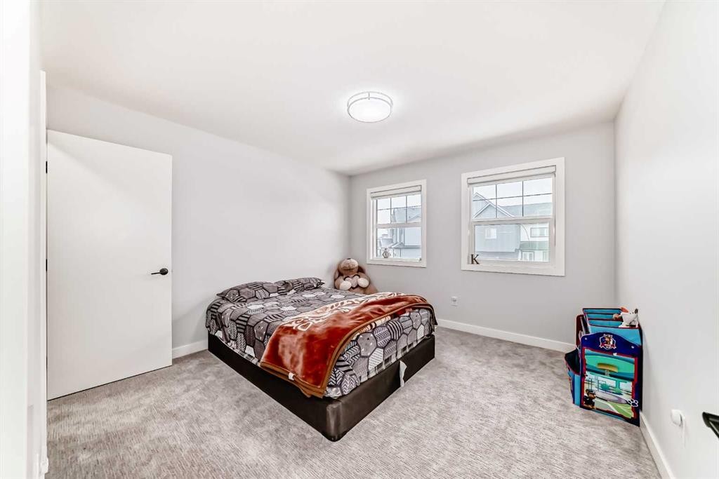 82 Waterford Crescent, Chestermere, AB - Indoor Photo Showing Bedroom