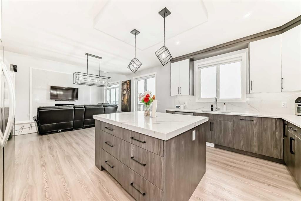 82 Waterford Crescent, Chestermere, AB - Indoor Photo Showing Kitchen With Upgraded Kitchen
