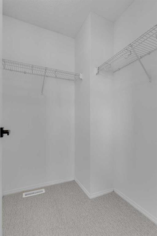 281 Elgin Gardens Se, Calgary, AB - Indoor With Storage