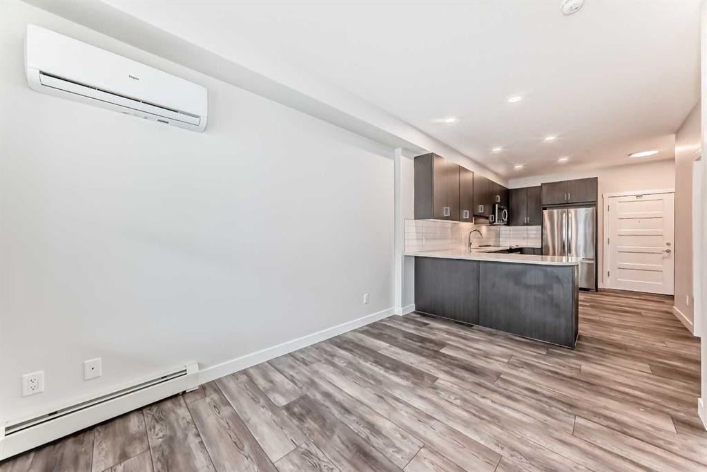 311-55 Wolf Hollow Crescent Se, Calgary, AB - Indoor Photo Showing Kitchen