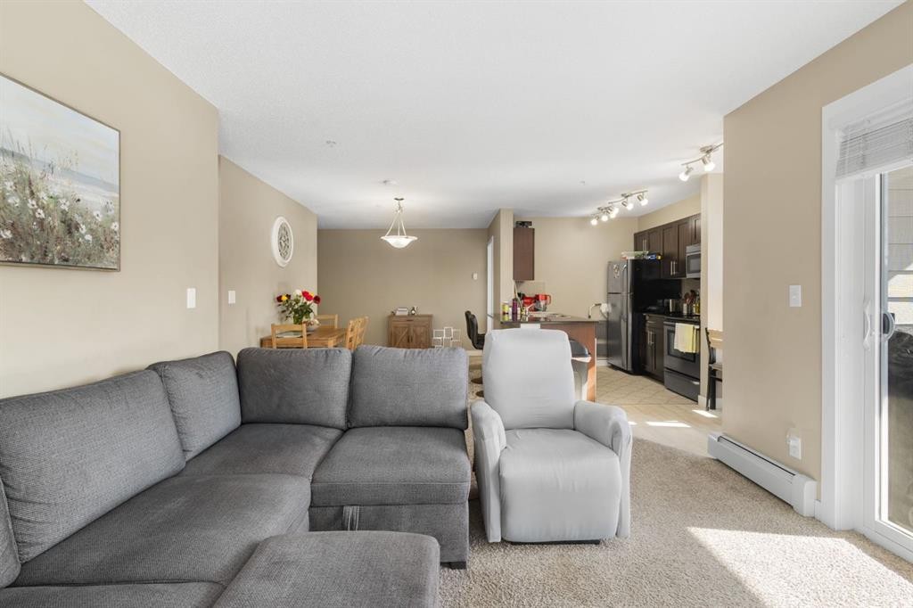 1237-81 Legacy Boulevard Se, Calgary, AB - Indoor Photo Showing Living Room