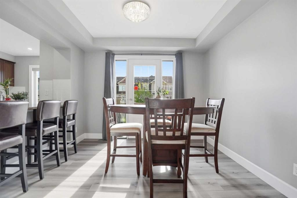 52 Windstone Green Sw, Airdrie, AB - Indoor Photo Showing Dining Room
