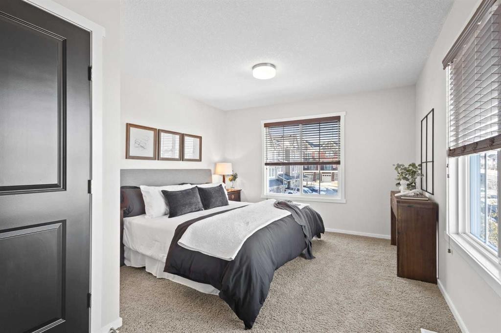 83 Evansview Gardens Nw, Calgary, AB - Indoor Photo Showing Bedroom