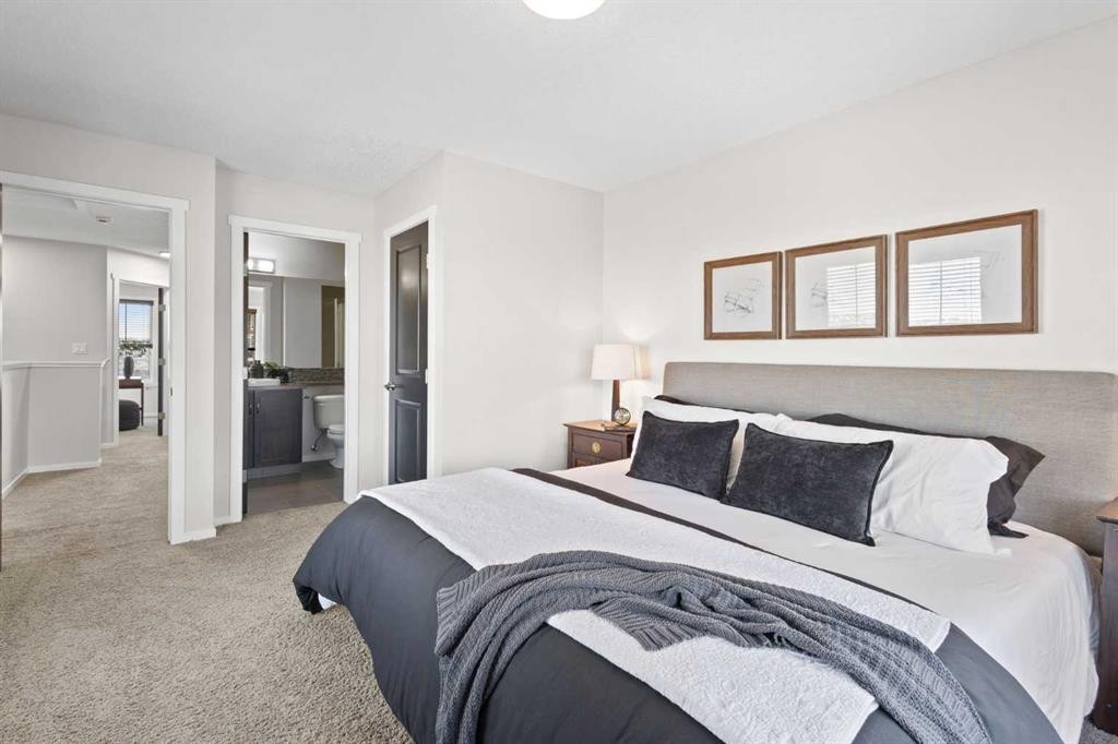 83 Evansview Gardens Nw, Calgary, AB - Indoor Photo Showing Bedroom
