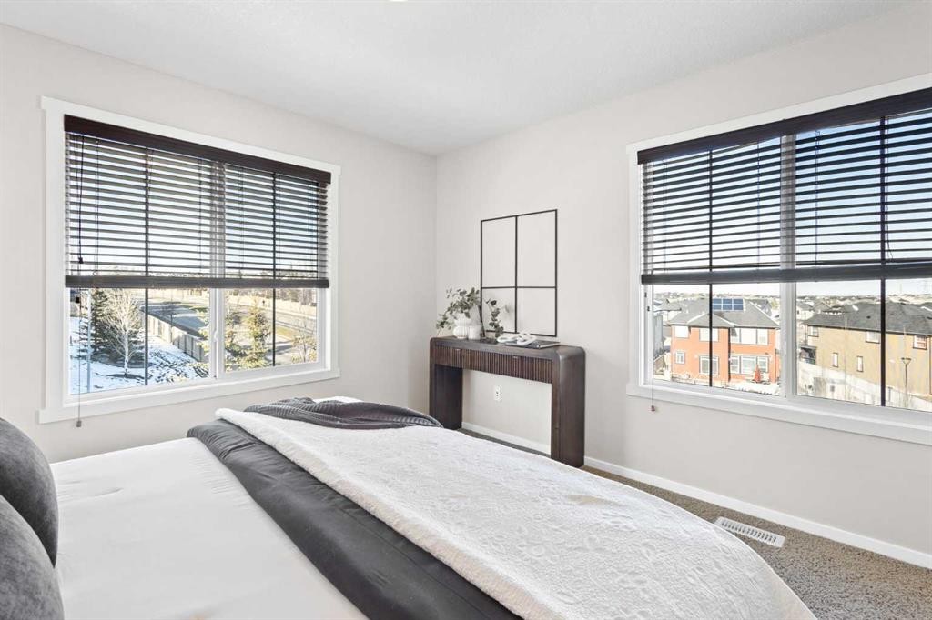 83 Evansview Gardens Nw, Calgary, AB - Indoor Photo Showing Bedroom
