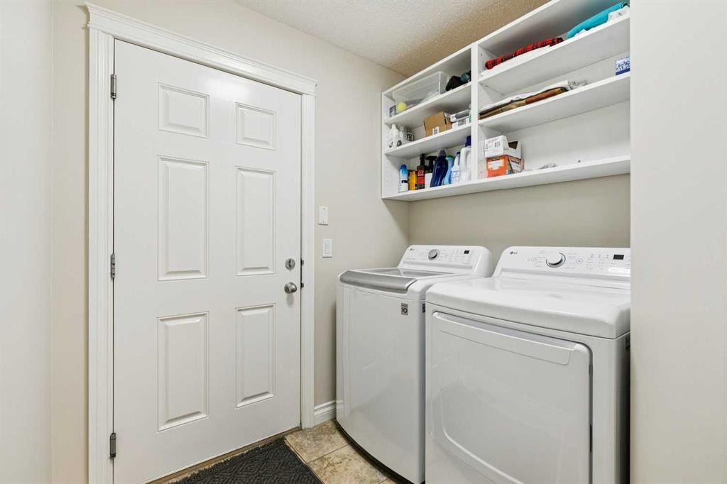 63 Westmount Circle, Okotoks, AB - Indoor Photo Showing Laundry Room
