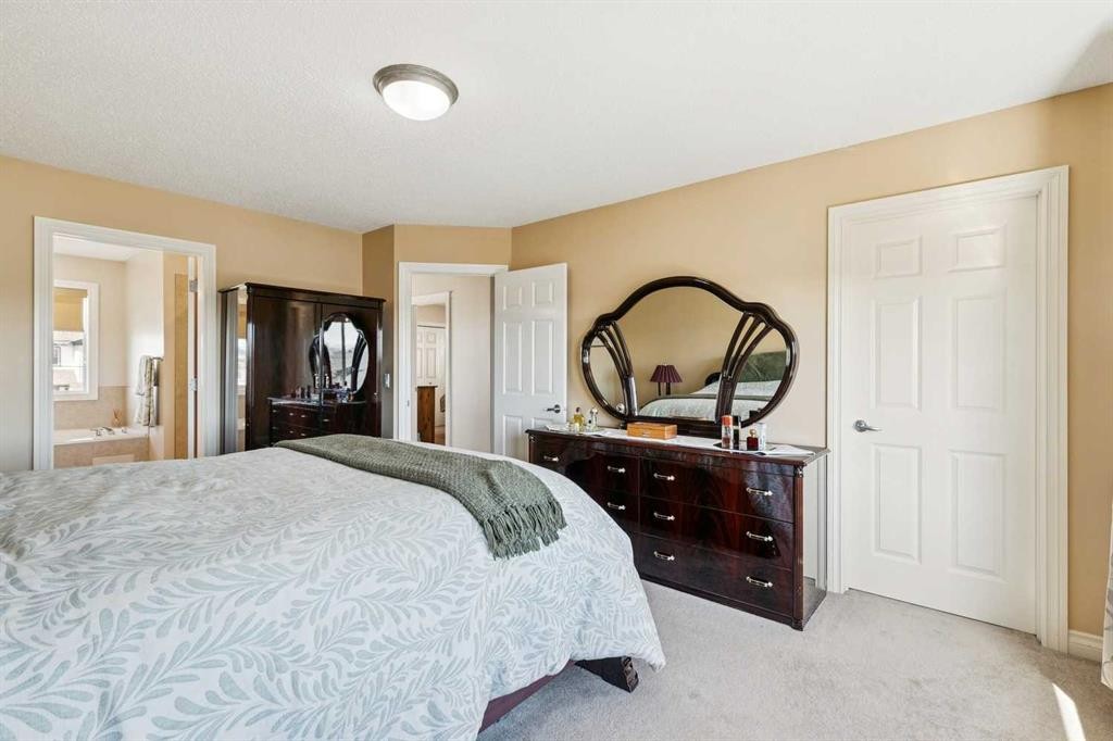 63 Westmount Circle, Okotoks, AB - Indoor Photo Showing Bedroom