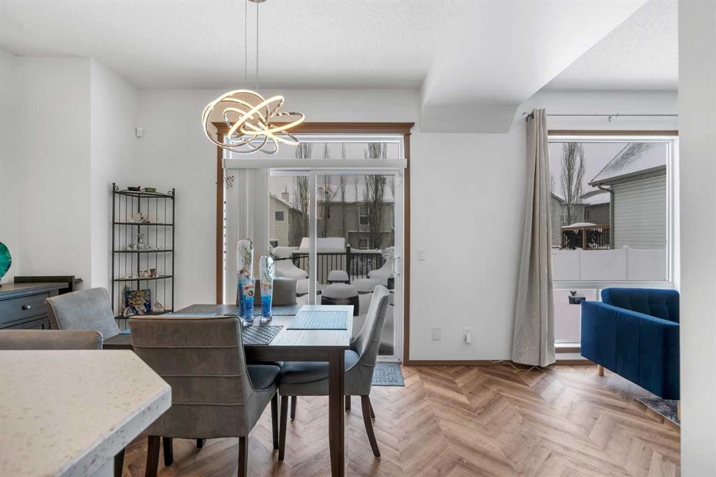 265 Bridlemeadows Common Sw, Calgary, AB - Indoor Photo Showing Dining Room