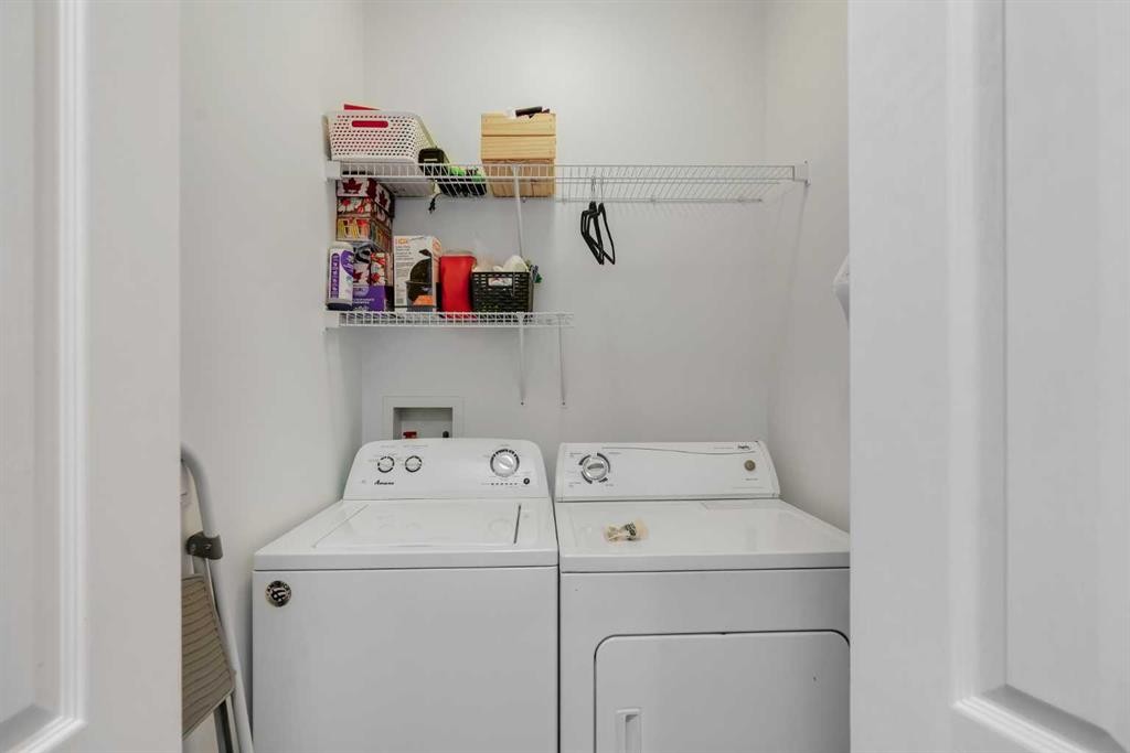 265 Bridlemeadows Common Sw, Calgary, AB - Indoor Photo Showing Laundry Room