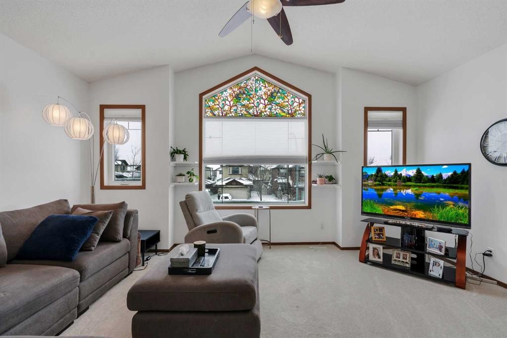 265 Bridlemeadows Common Sw, Calgary, AB - Indoor Photo Showing Living Room